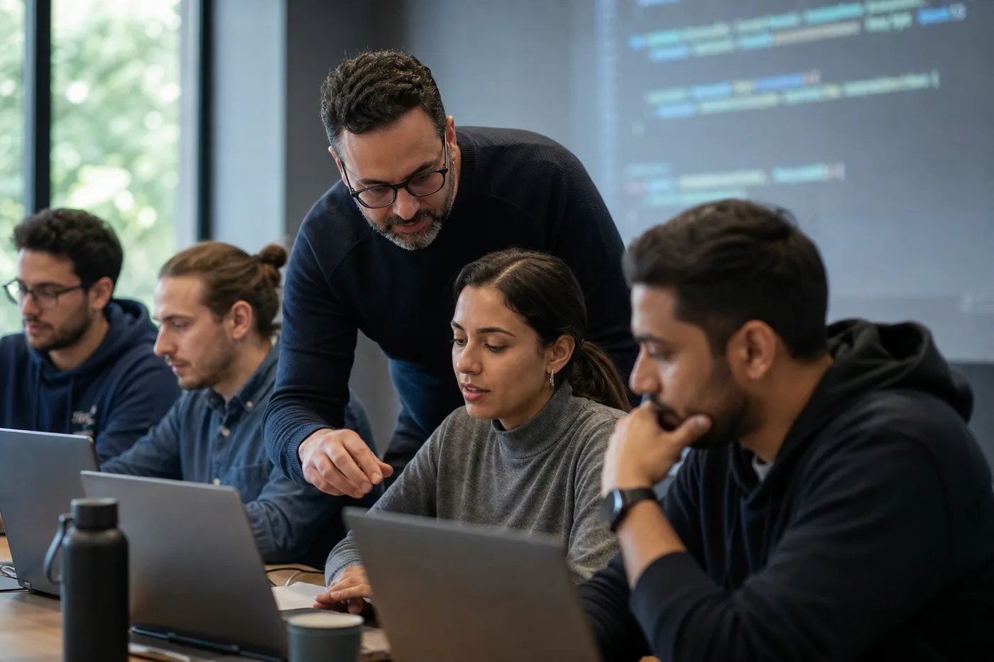 Developers learning together in a workshop
